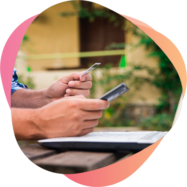 Person checking phone analytics outdoors